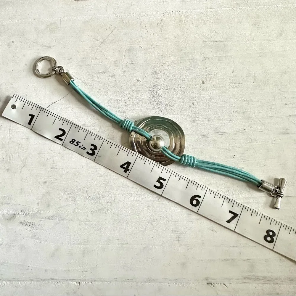 Silver tone blue cord bracelet silver tone